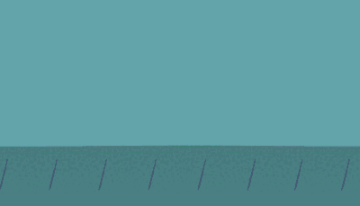 An open box is led along a conveyor belt where products are put into it